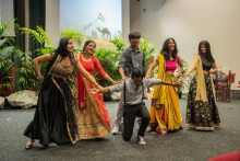 A group from India four girls in traditional costumes plus two boys.